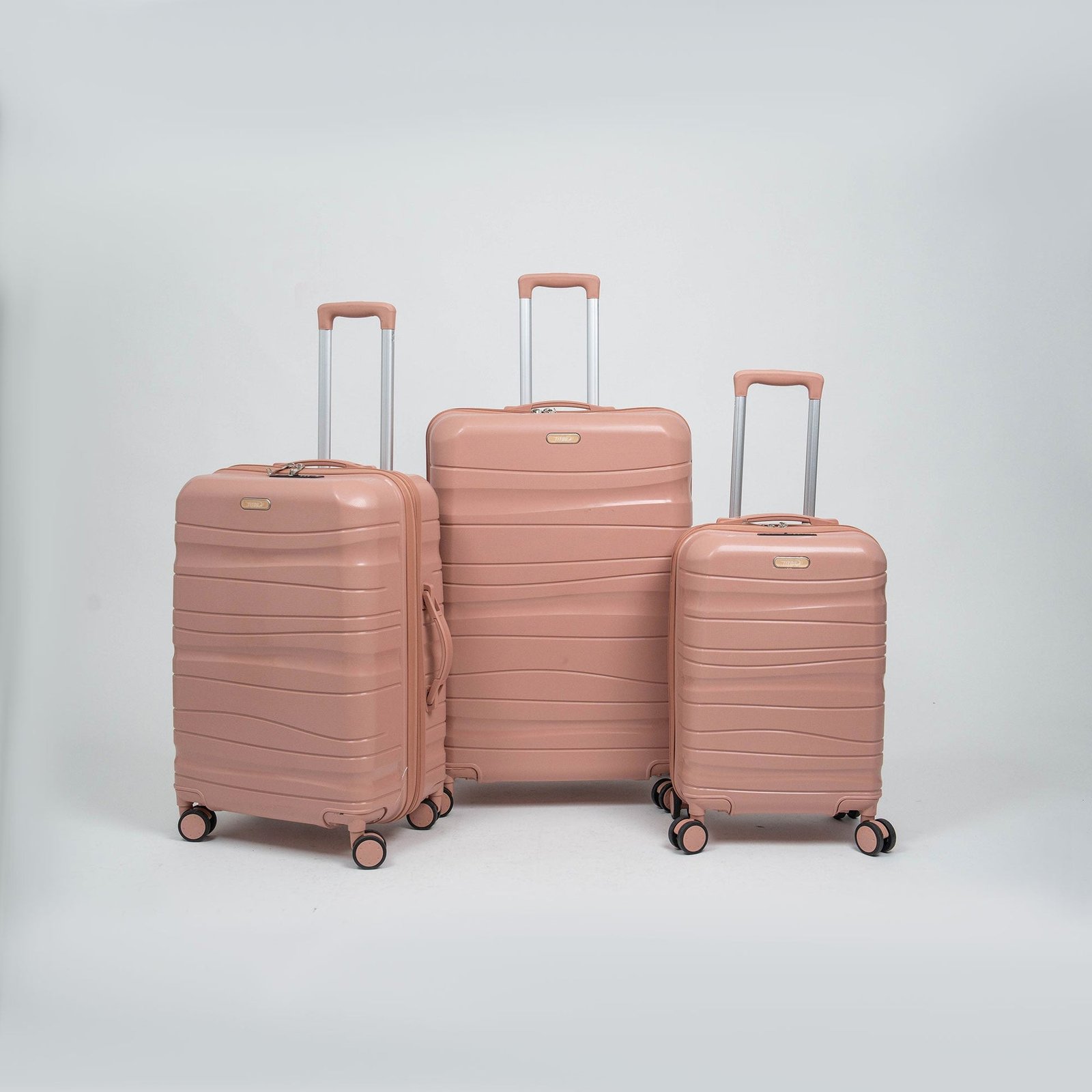 Set de trois valises avec roues démontables - Titou - Saumon